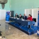 panel seated at table at national event italy 2022 in naples