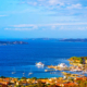 panorama costa smeralda mediterranean sea sardinia italy boats