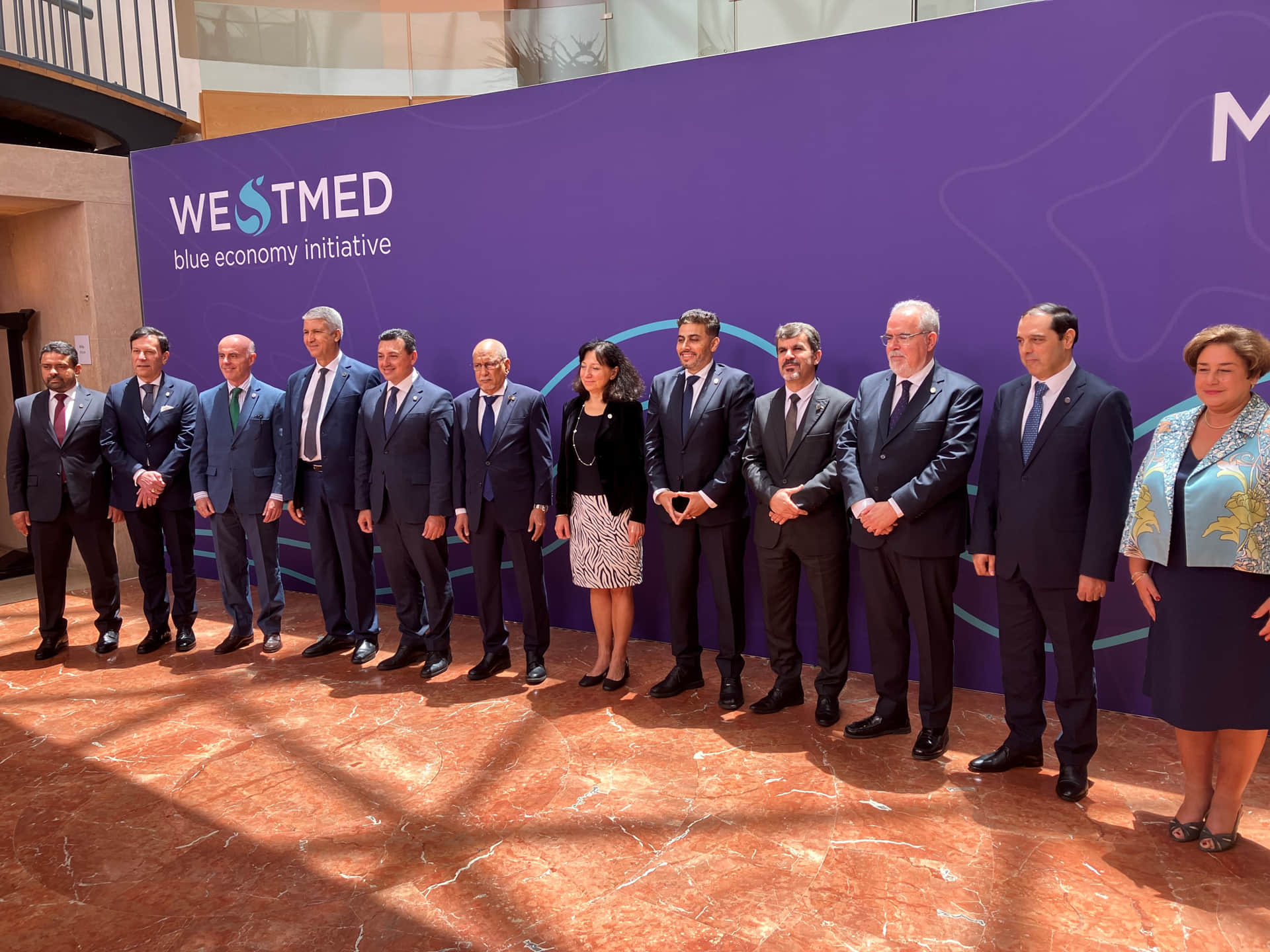 Ministers from WestMED countries and high level representatives, posing for the WestMED 2023 branded banner