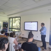 Colin Ruel and frederick Herpers moderating the workshop on EU funding in room filled with people