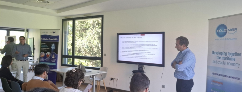 Colin Ruel and frederick Herpers moderating the workshop on EU funding in room filled with people