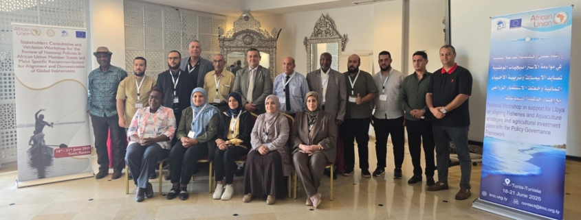 Group picture with people posing at workshop