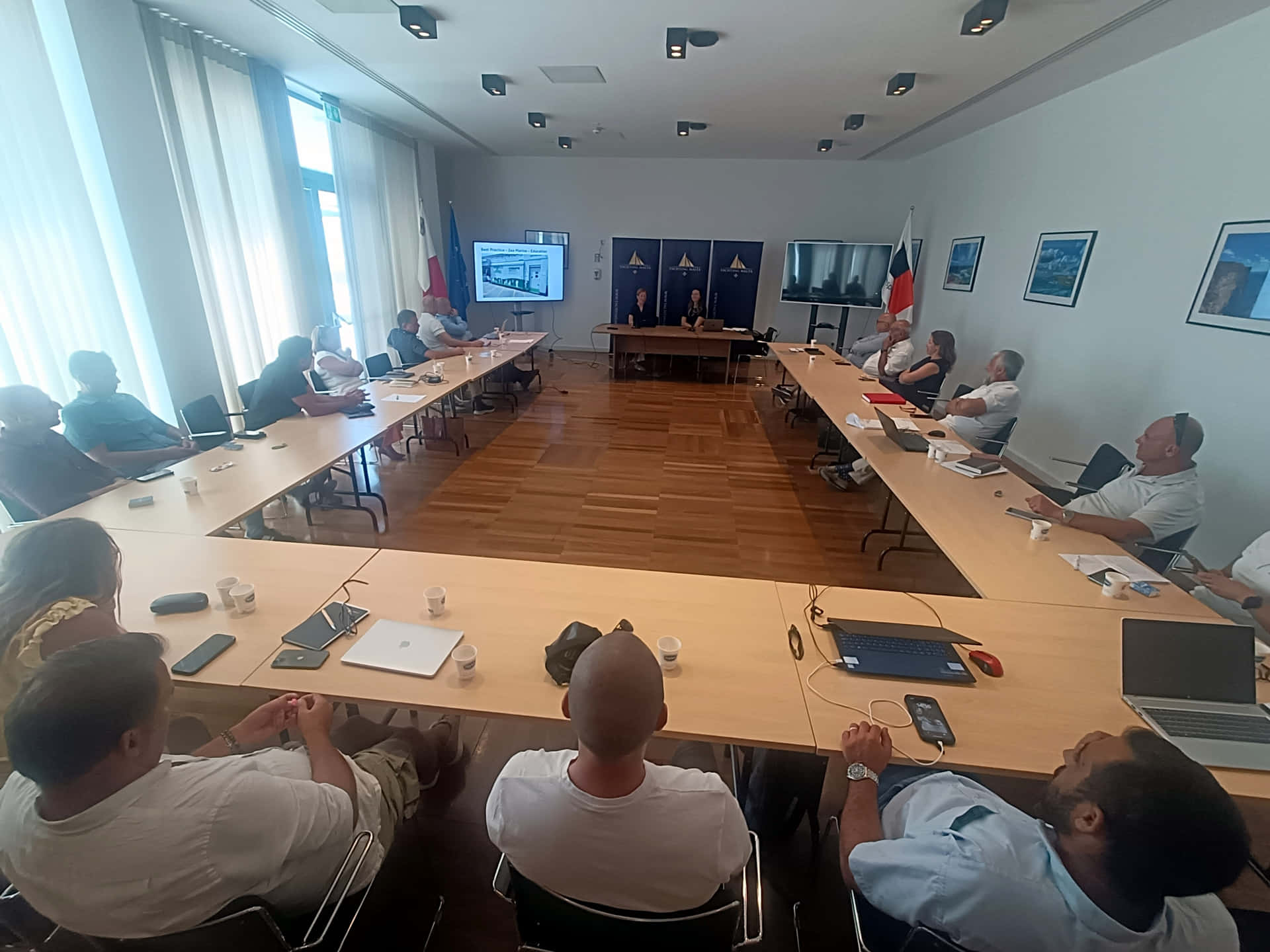People gathered in a conference room in Malta 1 July 2025 at Power4Med workshop