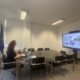 Portugal chairing the online WestMED meeting while seated and  looking at a screen with participants in a conference room - June 26, 2025
